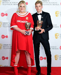 She dedicated the middle name to her late and utter unique friend. Baftas Creator Of Swindon Town Dress Thought Star Would Bottle Out Bbc News