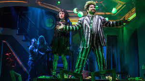 Beetlejuice is the stage name of american actor and comedian, lester green, who is known for his one of stern's best guests, beetlejuice sang the original song 'this is beetle' on the show in late beetlejuice, who used to participate in comic wrestling during his early career, recently challenged. Beetlejuice Broadway Review It S Showtime Ready Or Not Deadline