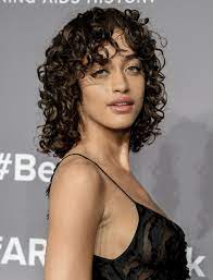 Tousled fringe + taper fade. See How To Style Curly Hair And Bangs The A List Way
