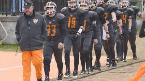 Five Burton football players