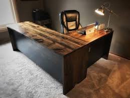 A weathered finish gives this smooth, hardwood desk a rustic yet refined look. Business Grain Designs