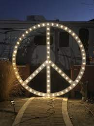 There are some outdoor sign lighting scenarios, where neon, led, or fiber optics are not appropriate. Eight Foot Round Marque Peace Sign For Holiday Lights In Front Yard Outdoor Christmas Holiday Lights Front Yard