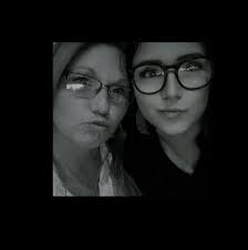 What are the small mounds with holes in my front garden?