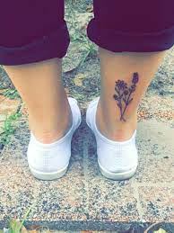 Wild Flower Tattoo Achilles Tattoo Above Heel Tattoo Heel Tattoos Tattoos Ankle Tattoo Small