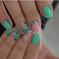 This next nail idea is one of our favorites because it is so elegant and beautiful. Nail Art 411 Best Nail Art Designs Gallery Bestartnails Com Green Nail Art Butterfly Nail Art Best Nail Art Designs