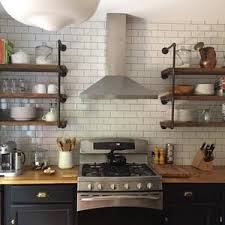 For a more modern look, consider gold and brass finishes in more geometric patterns. Farmhouse Industrial Rustic Wall Storage Open Shelving Unit Etsy