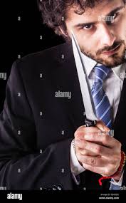 Homme d'affaires sournois Banque de photographies et d'images à haute  résolution