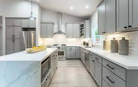 Kitchen cabinets cabinets kitchens gray open plan kitchen with blue island touches of gold—like the range hood's trim and the drawer pulls—give a luxurious glow to this gourmet kitchen's navy blue and charcoal gray palette. Kitchen Colors With Gray Cabinets Designing Idea