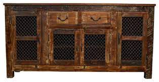 Buffet tables and sideboards built with wood, such as birch and acacia, lend a natural, rural vibe to dining areas. Reclaimed Wood Rustic Sideboard Buffet Table With Iron Grill Rustic Buffets And Sideboards By Favors Handicraft Fh023 Houzz