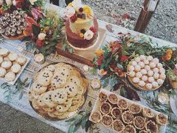 Wedding cupcakes are a modern alternative to traditional wedding cakes and serve as an interesting wedding table centerpiece. Nashville Sweets Dessert Table With Mini Pies Cookies Cupcakes Wedding Cake