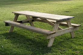 You get a sturdy wooden top table with benches and iron frame. Picnic Table Wikipedia
