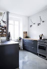 Putting your glasses in a standard base unit, as seen in the pretty cream kitchen above,is fine for a family that is under 5'9. Black Kitchen No Upper Cabinets Novocom Top