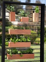 Once planted, we recommend a thorough watering while planter is horizontal. How To Make A Vertical Herb Garden From A Fence Vertical Garden Diy Vertical Herb Garden Small Backyard Landscaping