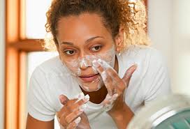 Image result for mOISTURIZING THE SKIN GETTY IMAGES
