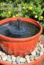 Start by leveling the ground where you'll set your pot, lay a paving stone down, and put your biggest pot on top of it. Solar Plant Pot Water Fountain In Under 15 Minutes Interior Frugalista