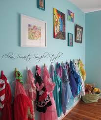 Girls Dress Up Storage On The Wall Will Keep Things Organized But She Can See What She Has To Play With Pe Blue Girls Rooms Dress Up Storage Girl Toy Storage