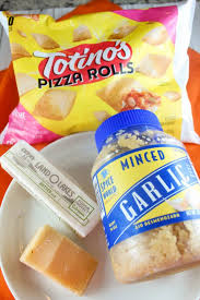 Line your air fryer basket with parchment paper and arrange the sliced rolls (messy side down) on the parchment paper. Air Fryer Pizza Rolls With Garlic Parmesan Butter The Food Hussy