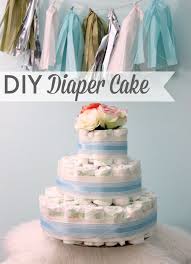 If the theme is ballerina or princess, you can add white, pink, or purple tulle trim to the bottom of the diaper cake. Baby Shower Diaper Cake Tutorial Katie Did What