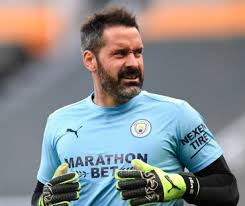 Profile page for manchester city football player scott carson (goal keeper). O Lhbmmwlawhmm