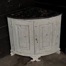 This swedish corner cabinet features vertically reeded details on the doors and sides, with the reeds coming to an upward point at the tops. Antique Painted Swedish Corner Cabinet Other Furniture European Antique Warehouse