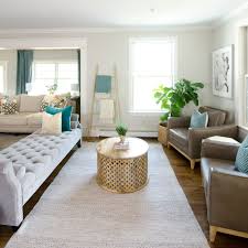 Beautiful Neutral Family Room With Pops Of Color And Wood Accents Backless Sofa Divides The Long Room Into Tw In 2020 Living Room Seating Long Living Room Family Room