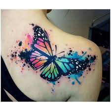 The ink mirrors a great itch for freedom and lightness. I Love This Tattoo It S A Bit Big For My Liking But I Love Butterfly S Transformation And Color Watercolor Butterfly Tattoo Butterfly Tattoo Designs Tattoos