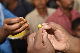 Fish Prasadam' is being distributed at exhibition grounds in Nampally,  Hyderabad. The Telangana government directed the Fisheries Department to  provide one lakh fishes to the Bathini family for 'fish prasadam' which is