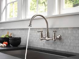 Shop kitchen sinks and more at the home depot. Two Handle Wall Mounted Kitchen Faucet 22722lf Ss Delta Faucet