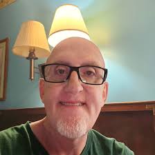 Not sure John Gwynne imagined his books reaching this demographic. Picture:  my 2 year old daughter seemingly reading the hunger of the gods