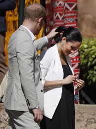 The duke of cambridge is always doting on meghan markle, but he stepped it up a notch during their visit. Ever The Attentive Husband Prince Harry Could Be Seen Assisting Meghan With Her Ponytail As The Lo Prince Harry And Megan Prince Harry And Meghan Prince Harry