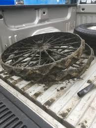 Old farm fence made of old rusty wagon & tractor wheels at the artisans at the dahmen barn is on the palouse scenic byway in uniontown, washington, old red farmall. Old Tractor Wheels Yesterday S Tractors