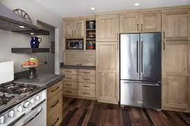 These cream cabinets team with walls painted and tiled in crisp white. Natural Custom Kitchen Cabinets Crystal Cabinets