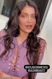 She struck a pose in. Kylie Jenner Dazzles In A Lilac Cut Out Dress That Flashes Her Cleavage Geeky Craze