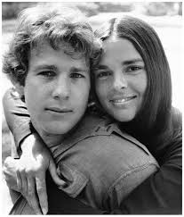 Ali McGraw embraces Ryan O'Neal in a scenes from the film “Love Story”  1970. (AP Photo)