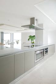 Gray Kitchen Island Installation Featuring Snaidero Idea Cabinets In Dove Grey High Gloss Lacqu Modern Grey Kitchen White Modern Kitchen Gray And White Kitchen