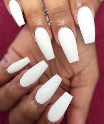 Coffin nails sound scary but they're sexy. White Coffin Nails Coffin Nails Designs White Acrylic Nails White Coffin Nails