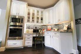 Unleash your inner interior decorator and use these cabinets for storage above a desk in children's rooms or. Working With A Built In Appliance Cabinets Com