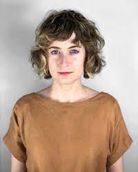 Shaggy French Bob With Wavy Texture Dark Blonde Balayage Blonde Balayage Feminine Hairstyles