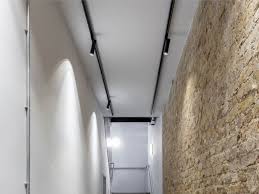 For living rooms, be sure to install the track roughly 20 inches from the walls for optimal beam spread as this will help evenly light up the space. Commercial Track Lighting Systems 299 Lighting