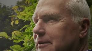 met een luipaard op schoot