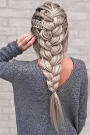 Multiple different styles of braid are crossed and weaved together for an otherworldly fantasy look. 24 Different Types Of Braids Every Woman Should Know Lovehairstyles Com Hair Styles Long Hair Styles Braided Hairstyles