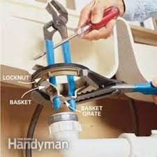 If you've updated your kitchen and added a new sink or moved the old one, you'll need to install updated plumbing for the drainage and water supply under the basin. How To Replace A Kitchen Sink Basket Strainer Sink Basket Kitchen Sink Under Sink Plumbing