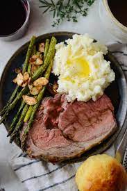 This prime rib roast is encrusted in a mixture of fresh rosemary, dijon mustard plus fresh thyme, garlic, and olive oil for irresistibly good flavors. Dijon Rosemary Crusted Prime Rib Roast With Pinot Noir Au Jus Simply Scratch