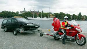 Hydraulically deploys, stows and stores high speed tow dollies in a pickup truck bed. How To Tow A Two Wheel Drive Vehicle Howstuffworks