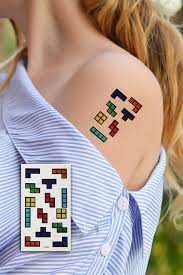Halves of a fluttering butterfly. Takistir Bijouterie Online Temporary Tetris Mini Tattoo