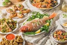 Eating fish on christmas eve traces back to the roman catholic tradition of abstaining from meat on fridays as well pasta dishes often accompany this seafood spread, but since the meal is more complex we keep it sides and dessert. Feast Of The Seven Fishes History Behind The Tradition Lovetoknow