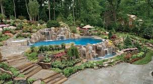 Pool Waterfall Ideas You Can Recreate In Your Backyard Decor Around The World Pool Landscape Design Backyard Pool Pool Landscaping