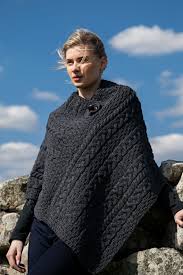 Women's lantern sleeve hollow stand collar temperament chiffon shirt solid color loose temperament. Cable Knit Aran Poncho Aran Islands Knitwear