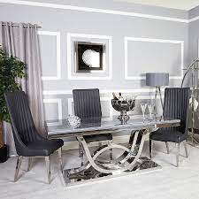 Many dining room chairs are approximately 45cm wide, give or take a few centimetres. Zenia Grey And Chrome Dining Table And 6 Dark Grey Dining Chairs Set Picture Perfect Home