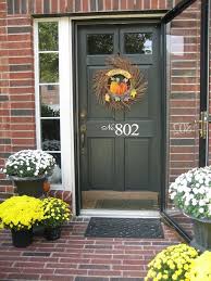 We took ours off since we were replacing our 35 year old hardware. How To Paint A Door Without Removing It Painted Front Doors Brick House Front Door Colors House Paint Exterior